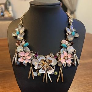 Adorable and fun floral bib necklace.